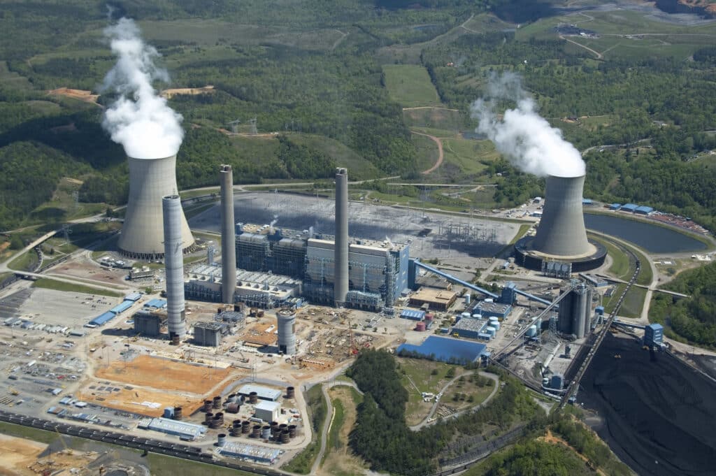 A birds-eye image of a power station with huge equipment that needs regular inspection and servicing